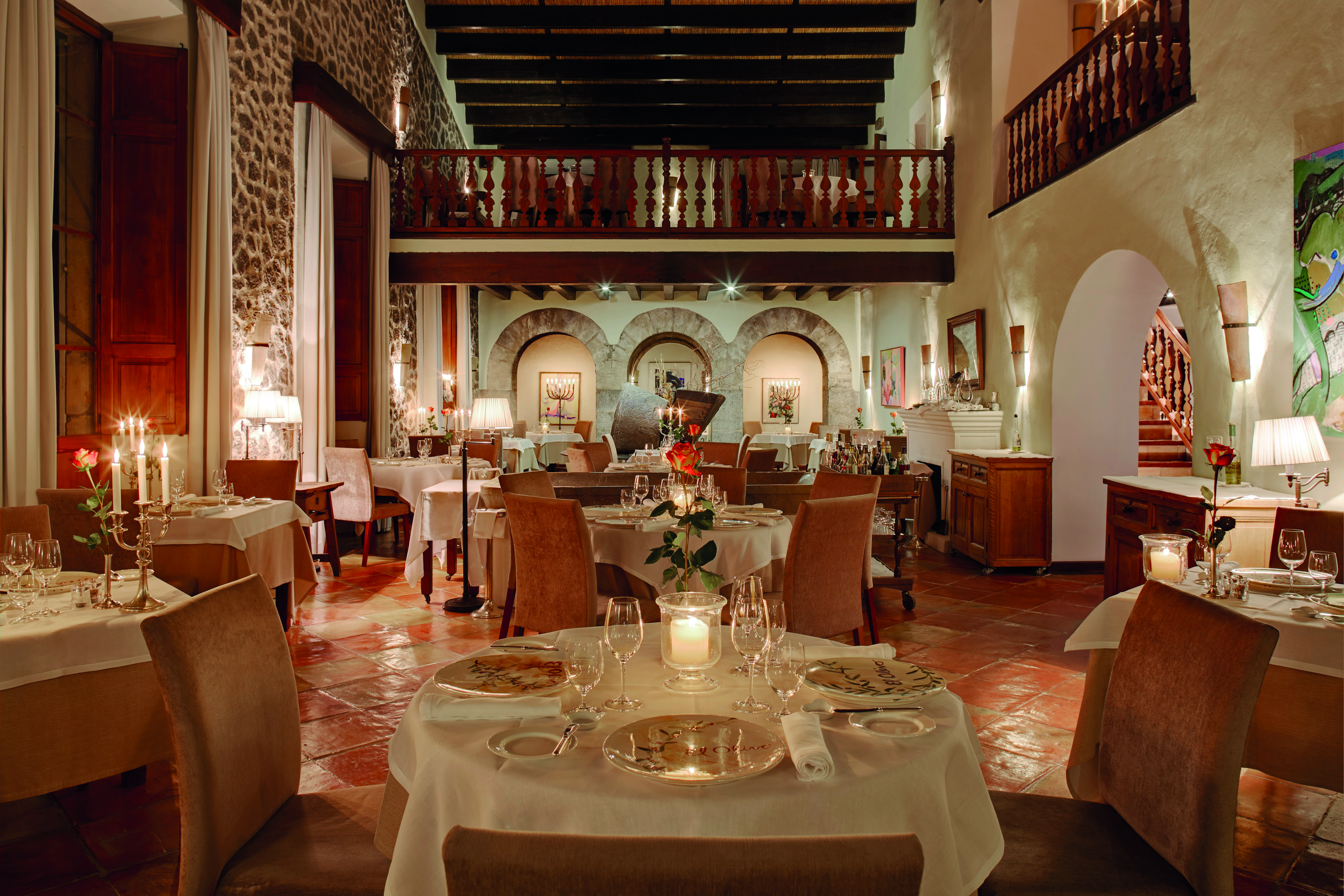 La Residencia Mallorca restaurant indoor dining rustic classic decor exposed stone walls