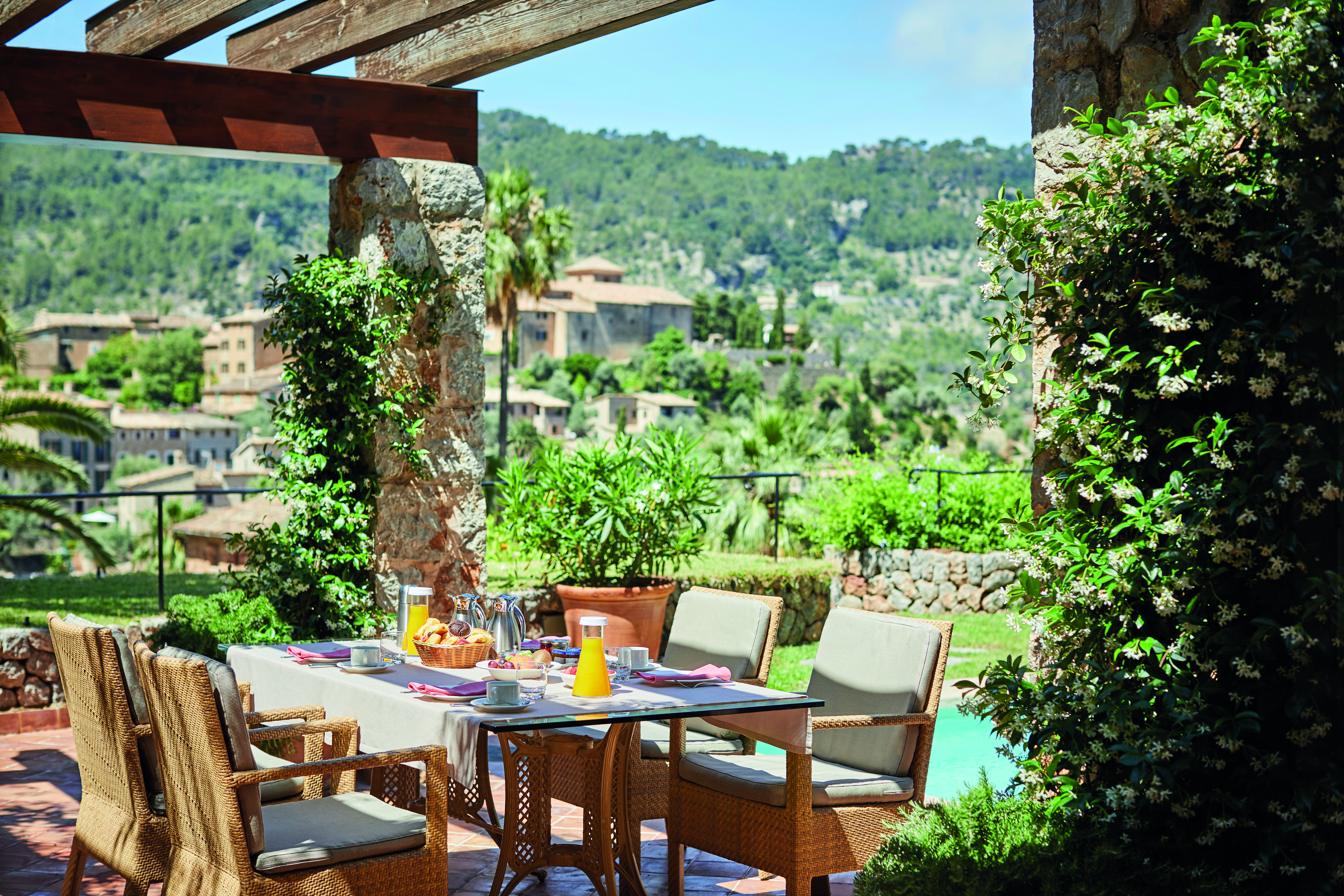 La Residencia Mallorca terrace dining breakfast private pool hillside view