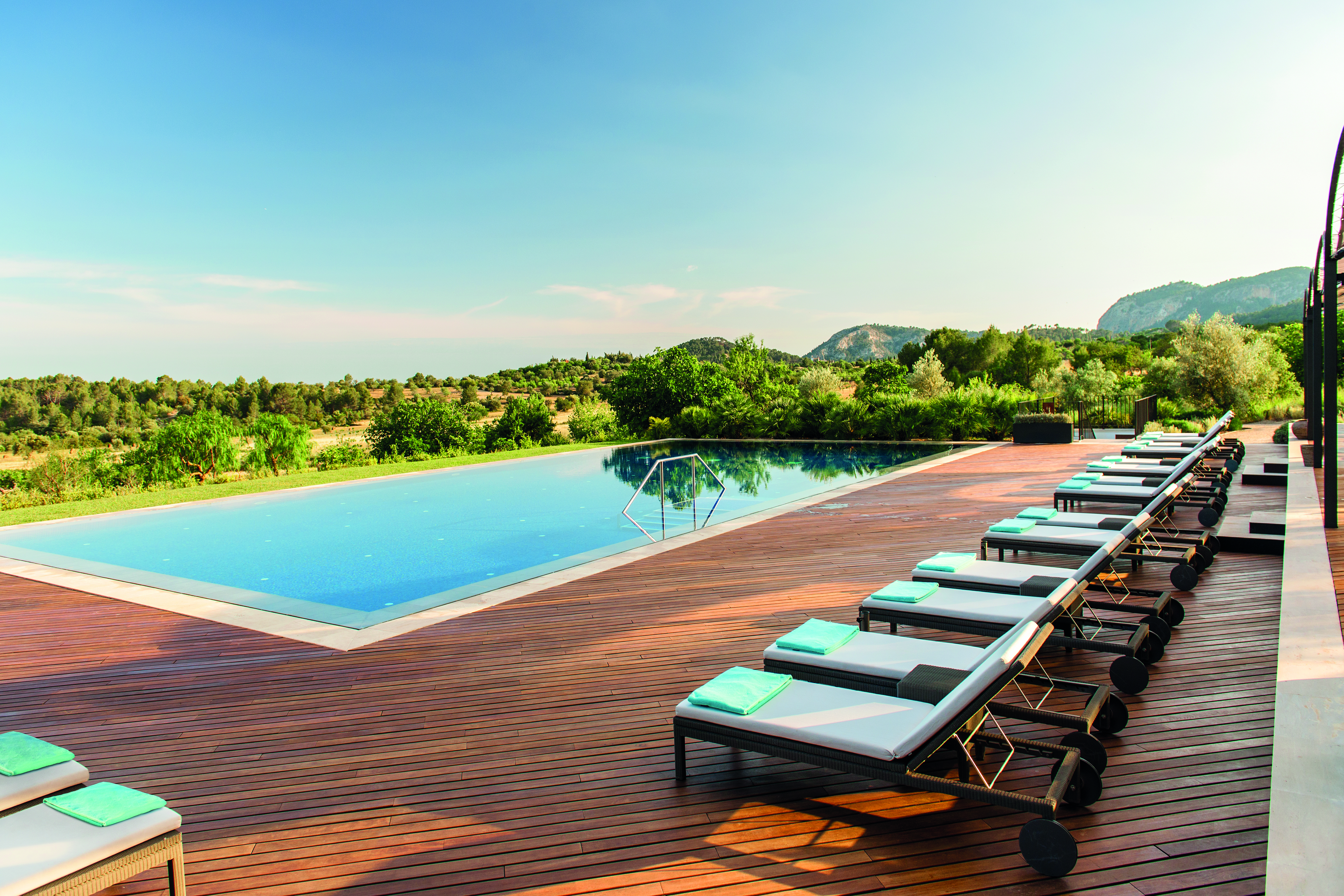 Castell Son Claret Mallorca pool sun loungers countryside surrounds