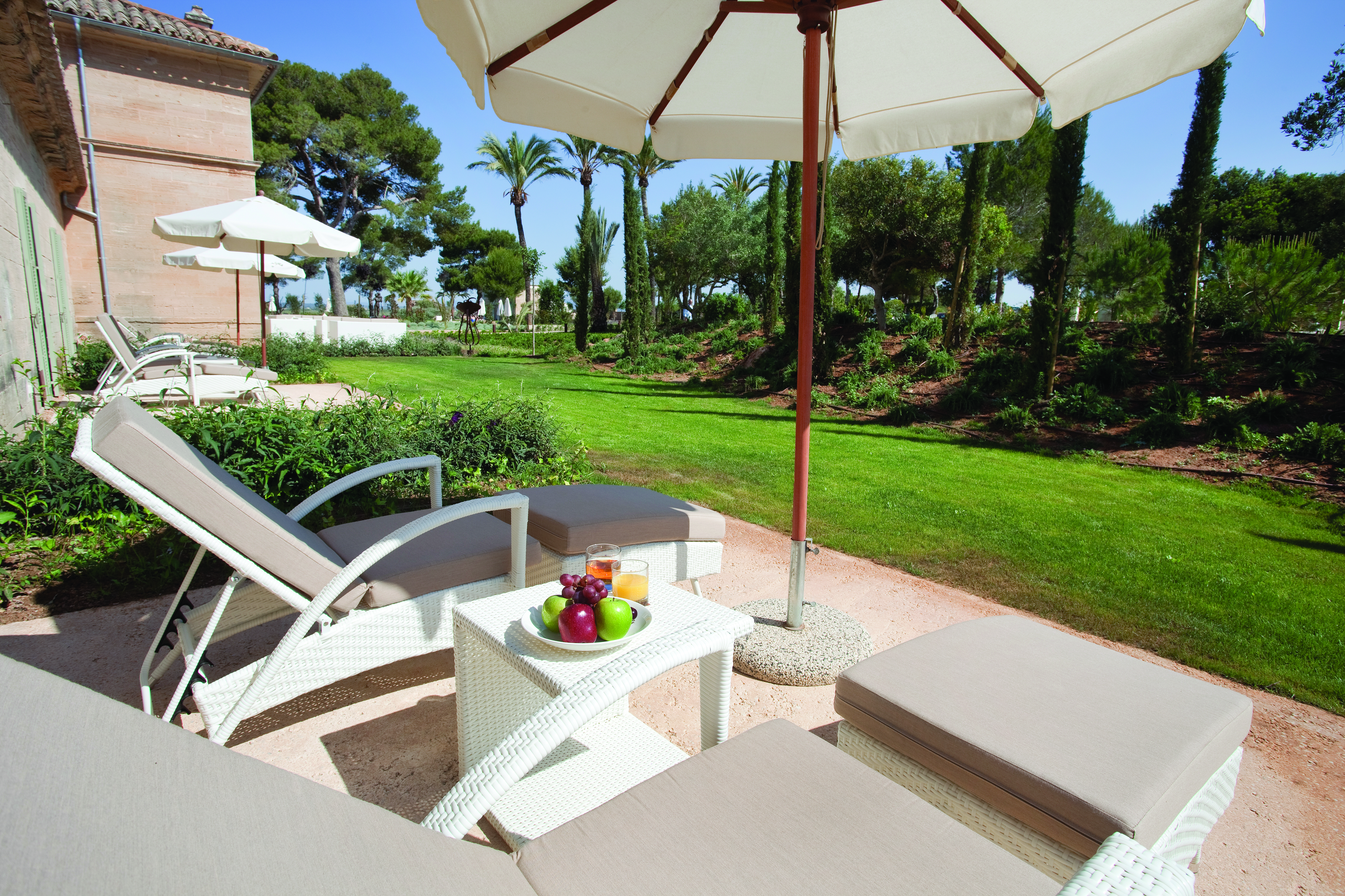 Font Santa Mallorca terrace outdoor seating sun loungers umbrella garden views