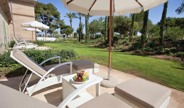 Font Santa Mallorca terrace outdoor seating sun loungers umbrella garden views