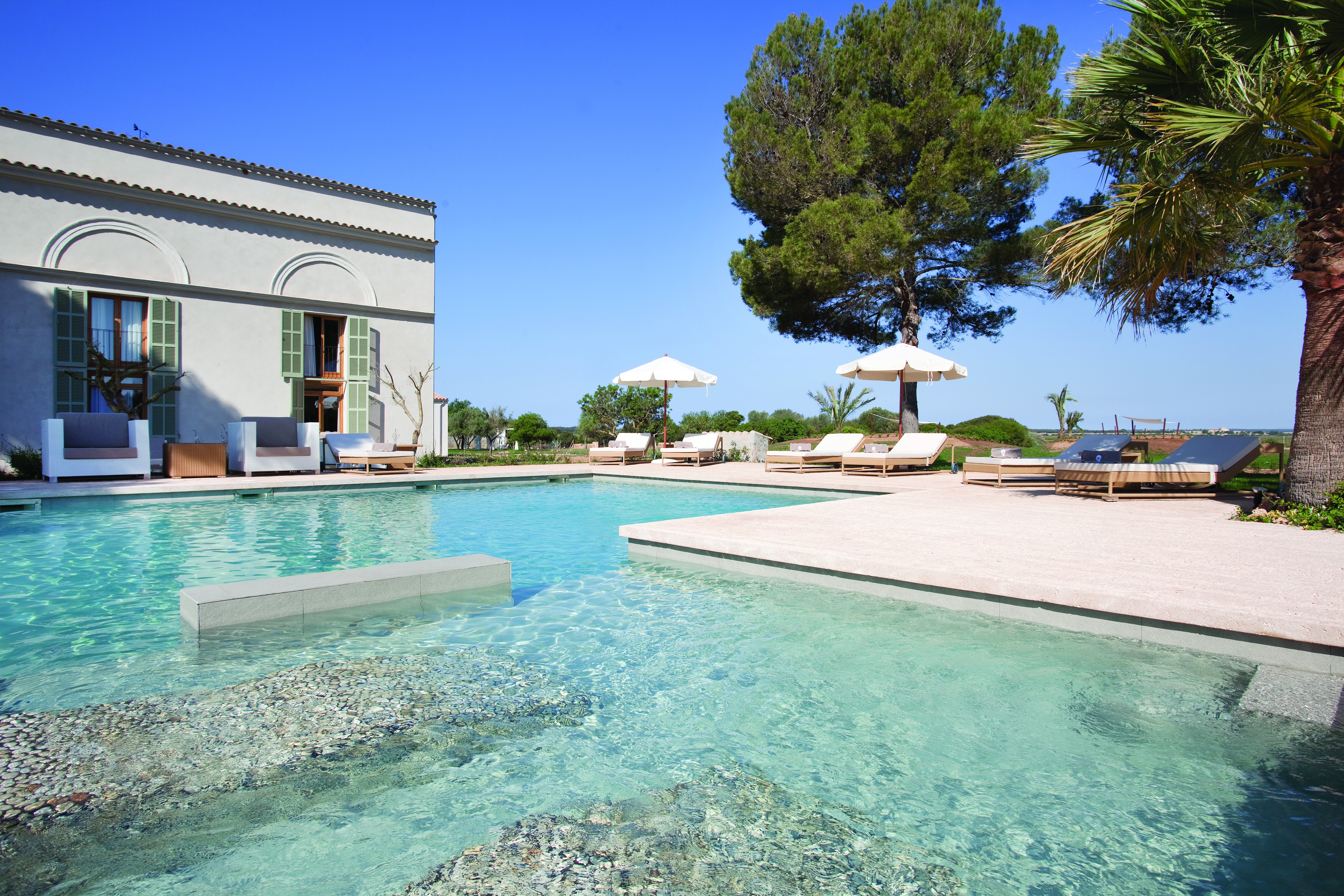 Font Santa Mallorca thermal pool sun loungers umbrellas lawn