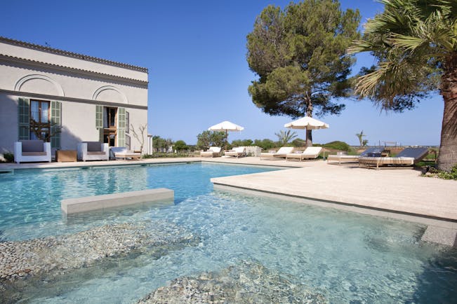 Font Santa Mallorca thermal pool sun loungers umbrellas lawn