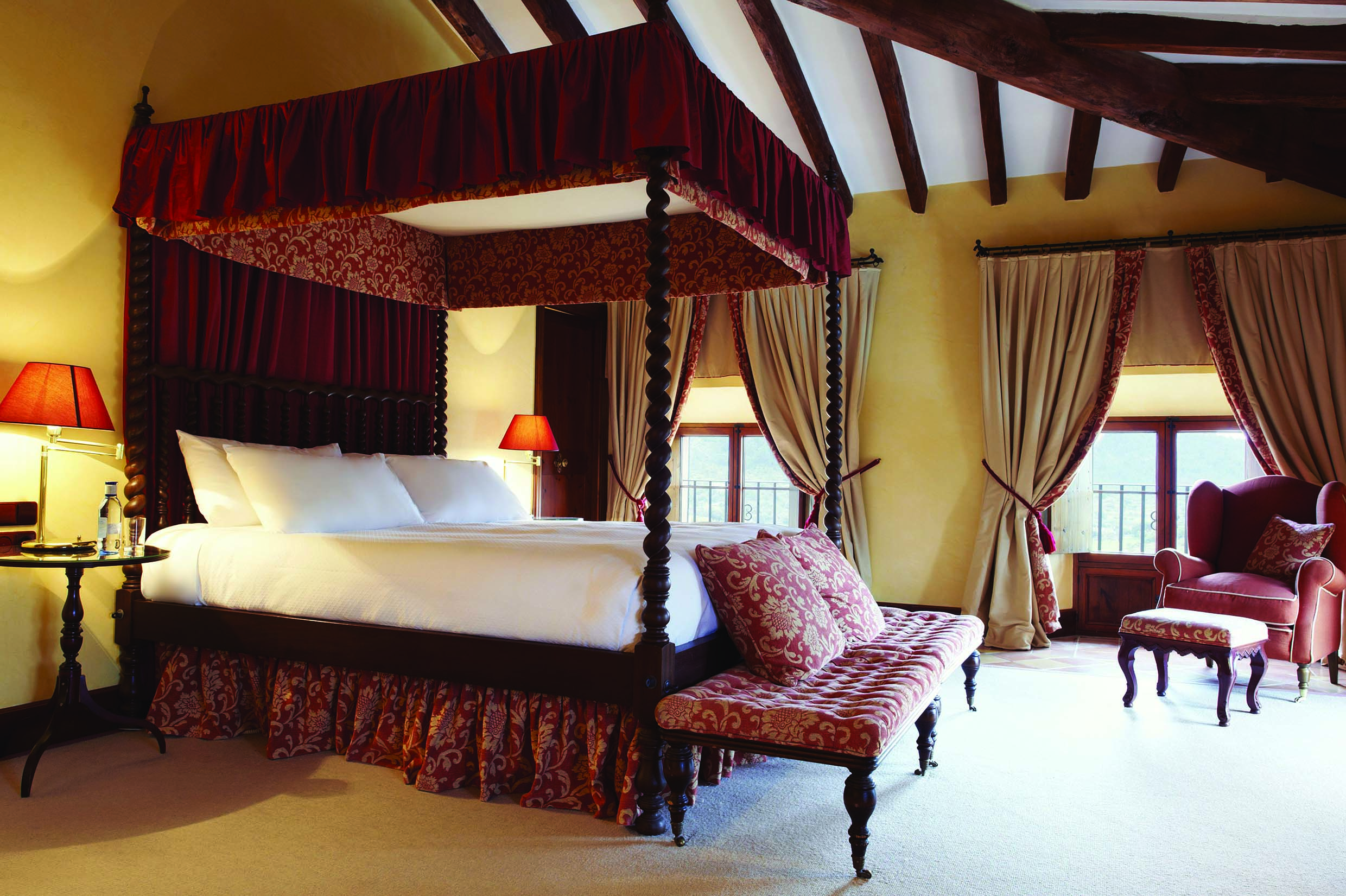 Gran Hotel Son Net Mallorca deluxe room four poster bed traditional décor