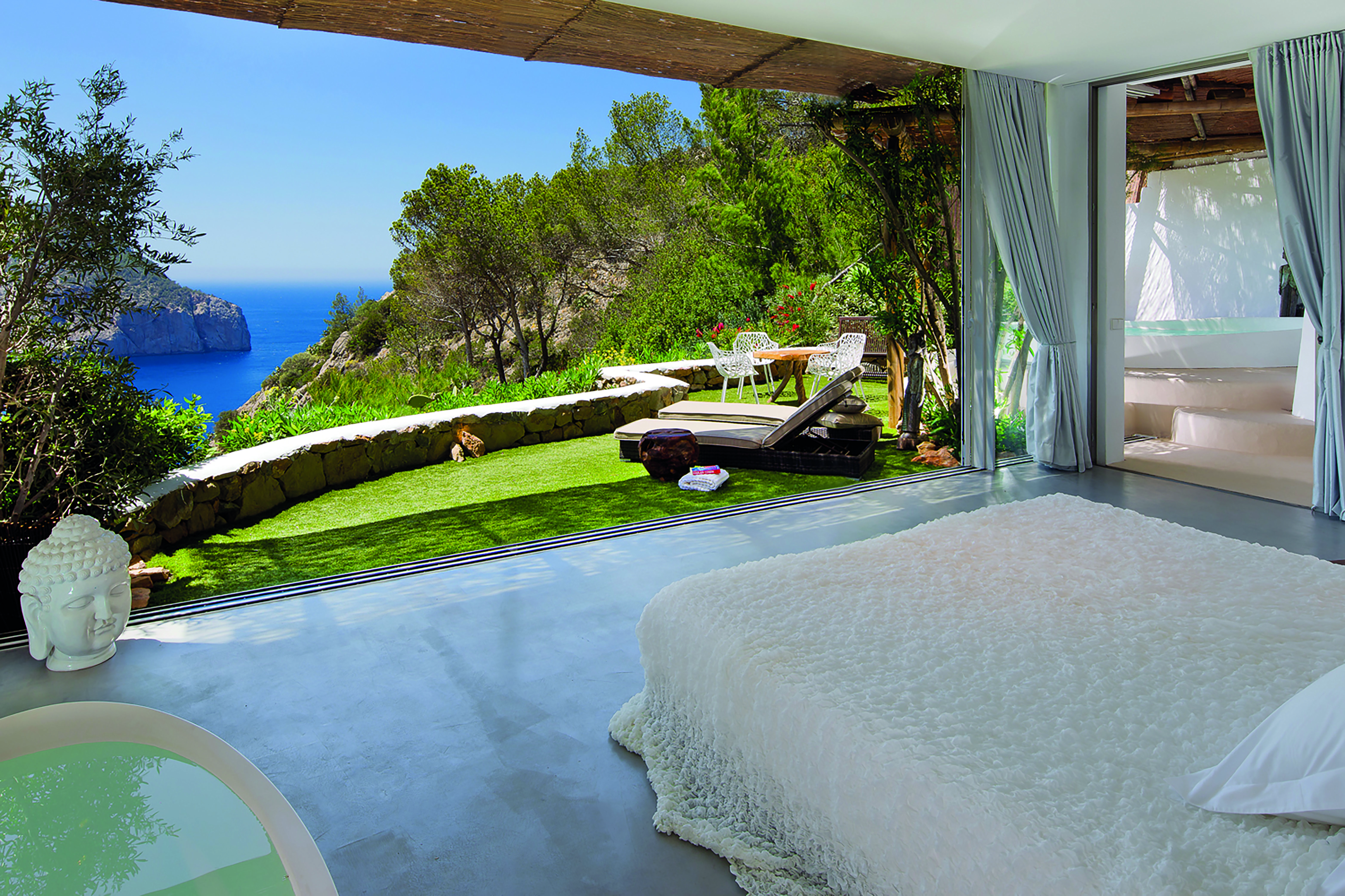 Hacienda Na Xamena Ibiza balcony chairs sun loungers mini pool ocean views