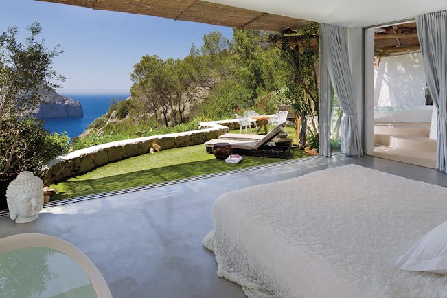 Hacienda Na Xamena Ibiza balcony chairs sun loungers mini pool ocean views