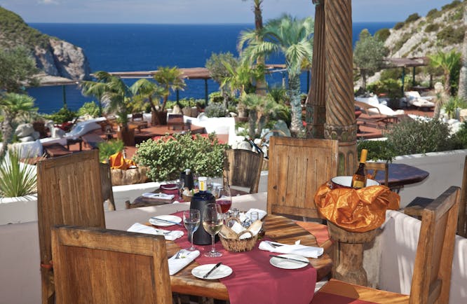Hacienda Na Xamena Ibiza restaurant dining area terrace overlooking the sea