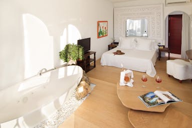 Hacienda Na Xamena Ibiza standard bedroom bed bath tub elegant décor