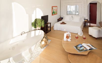 Hacienda Na Xamena Ibiza standard bedroom bed bath tub elegant décor