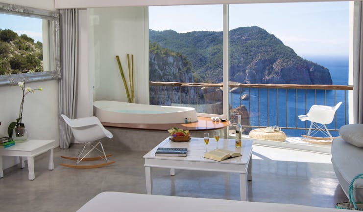 Hacienda Na Xamena Ibiza superior guest room jacuzzi terrace sea and coastline views