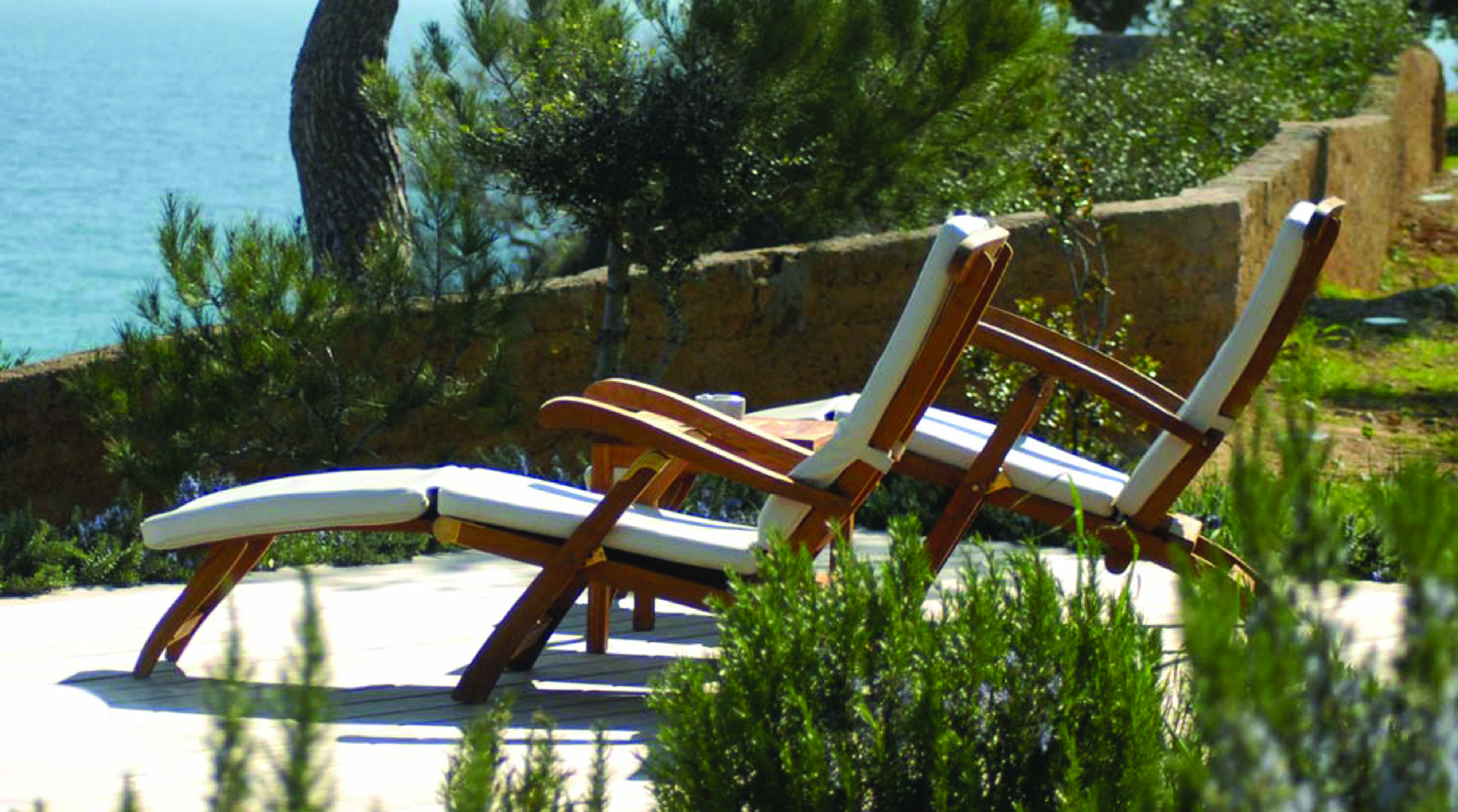 Can Simoneta Mallorca terrace sun loungers garden views sea in background