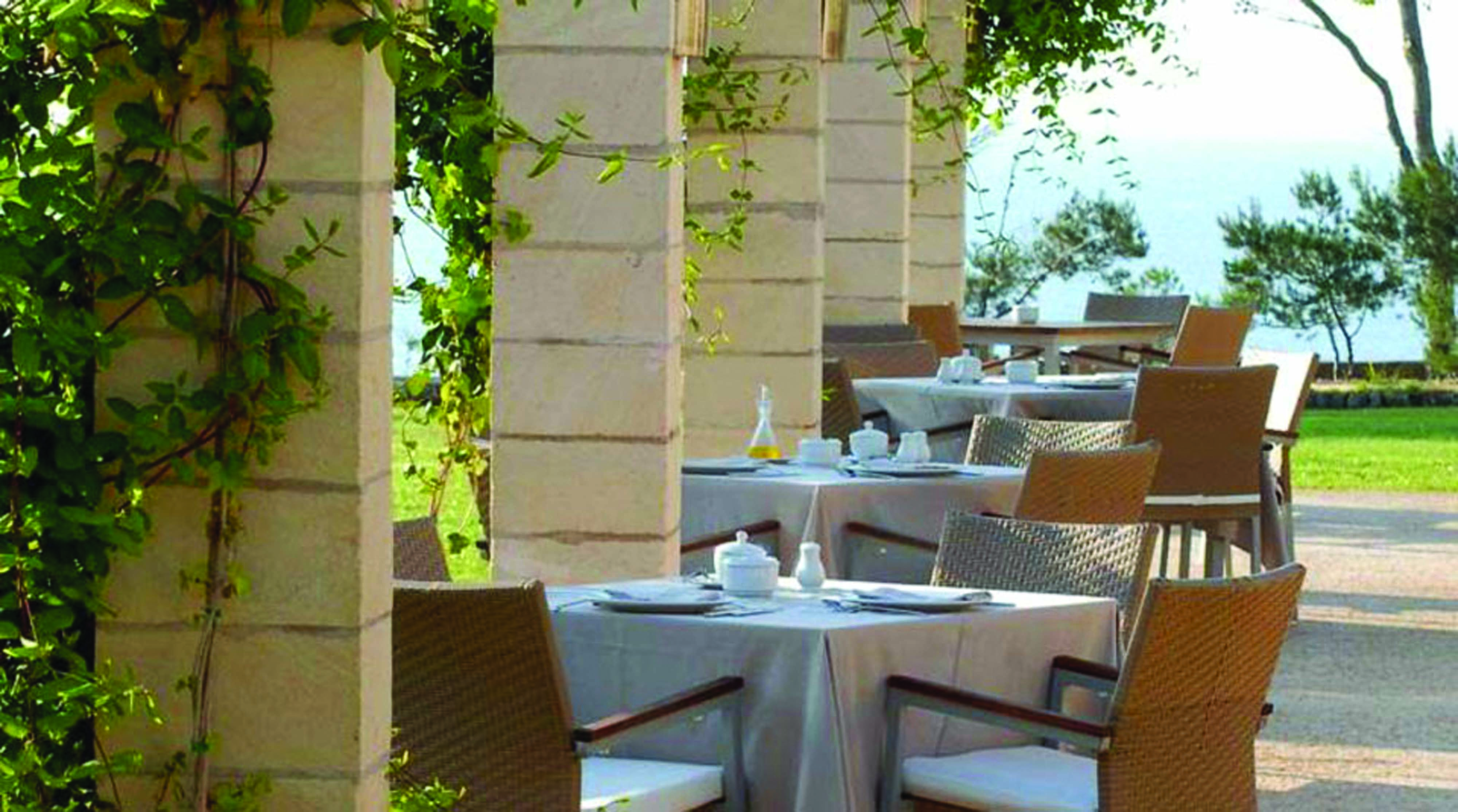 Can Simoneta Mallorca outdoor dining terrace views of gardens and sea