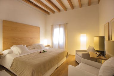 Convent de la Missio Mallorca double room armchairs bed modern décor
