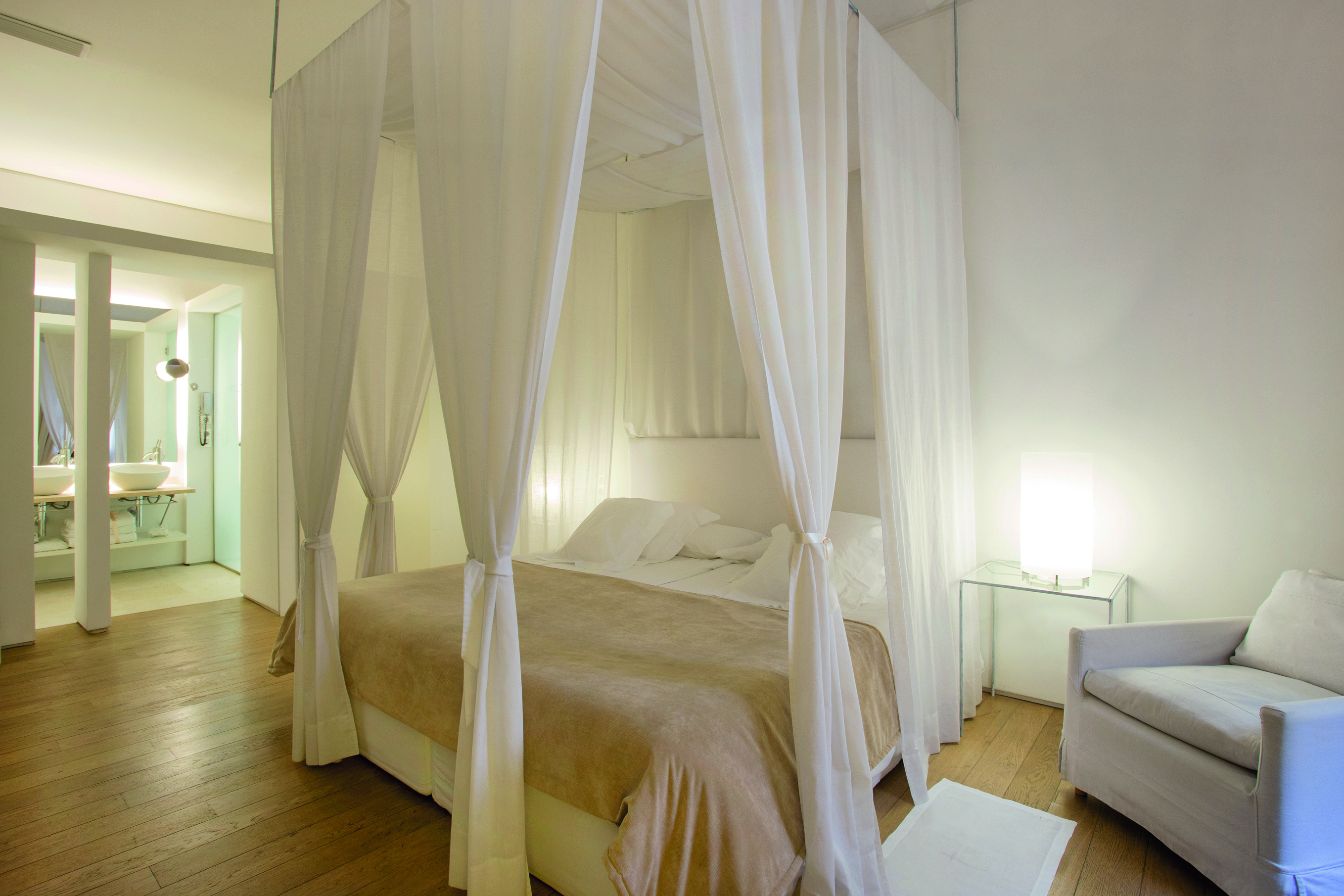 Convent de la Missio Mallorca superior double canopied bed en suite bathroom modern décor
