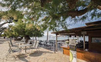 Hotel Illa d'Or Mallorca terrace bar outdoor dining overlooking the sea