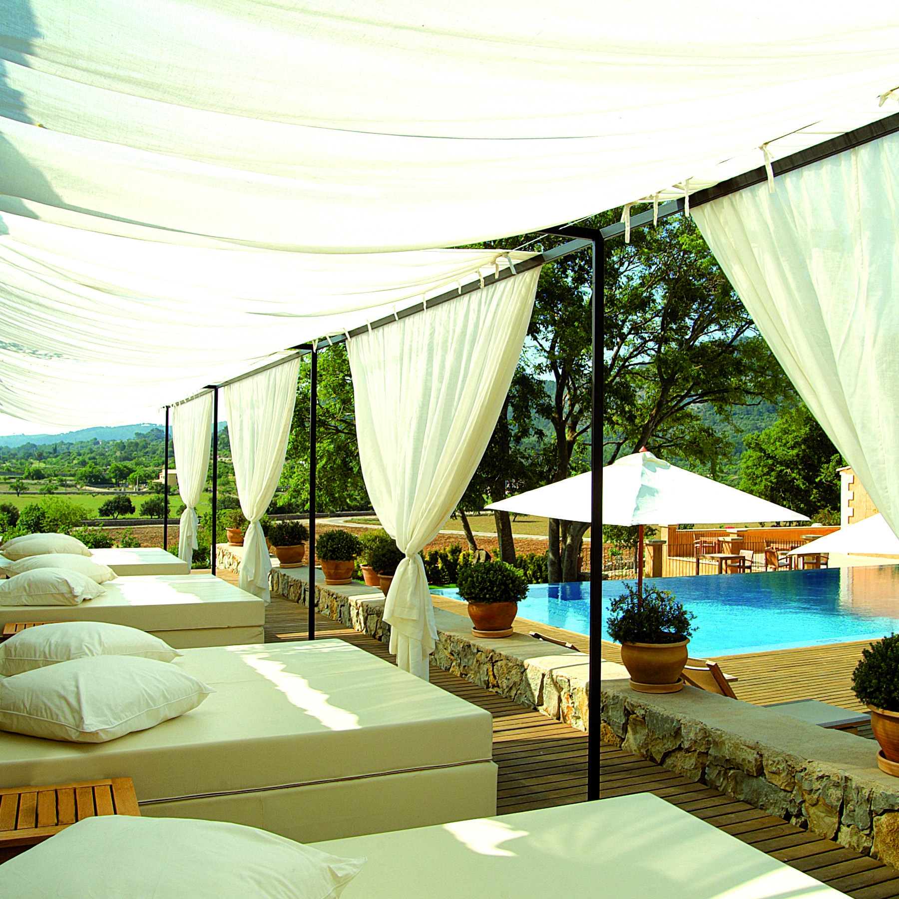 Son Brull Mallorca pool canopied sun loungers countryside views