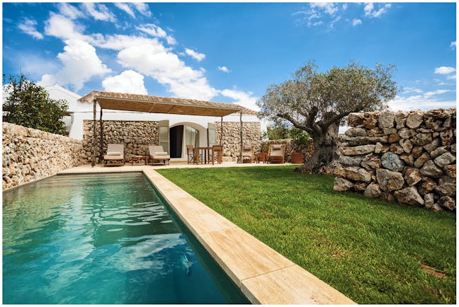 Torralbenc Menorca pool cottage private pool and garden terrace sun loungers lawn trees