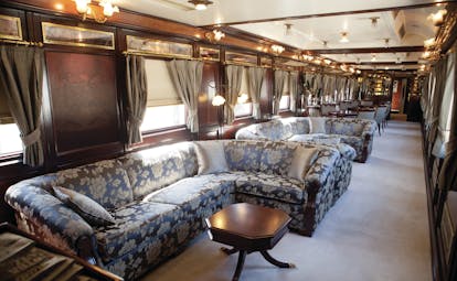 Blue sofas in train carriage