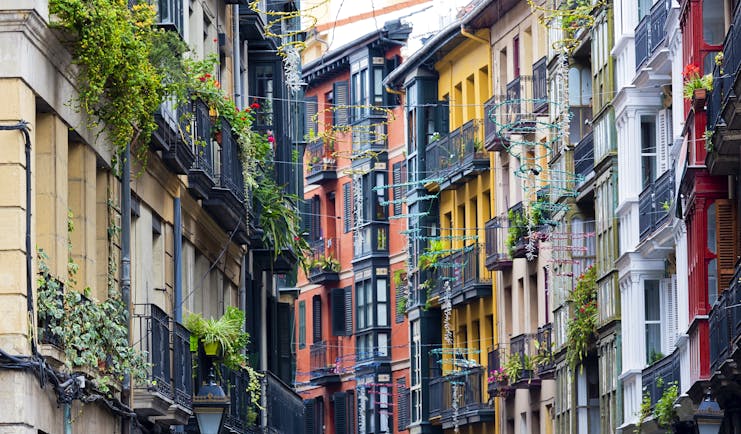 Multi-coloured tall and narrow houses in the casco viejo of Bilbao