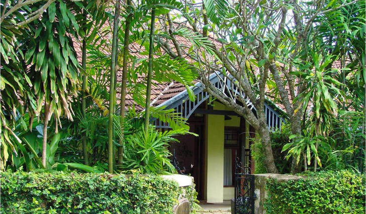 Havelock Place Bungalow Sri Lanka exterior of bungalow with trees 