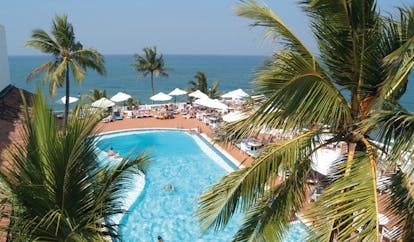 Mount Lavinia Hotel Sri Lanka aerial pool sun loungers umbrellas and palm trees