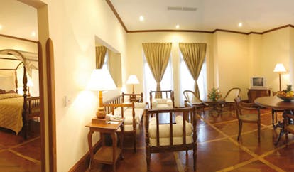 Mount Lavinia Hotel Sri Lanka Governor's wing suite lounge with sofas and view of bedroom