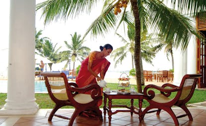 Mount Lavinia Hotel Sri Lanka inner terrace woman in saree serving afternoon tea 