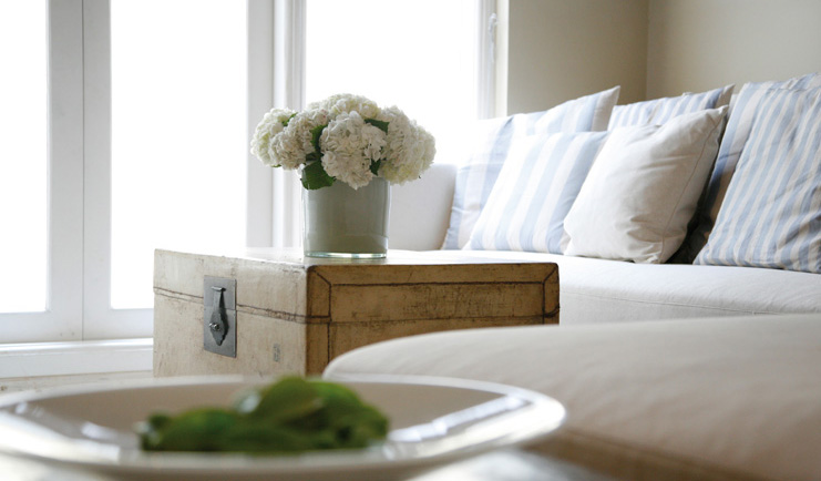 Paradise Road Tintagel Sri Lanka suite lounge with sofa and white flowers