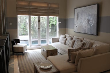 Paradise Road Tintagel suite lounge, soda, large windows, elegant modern decor