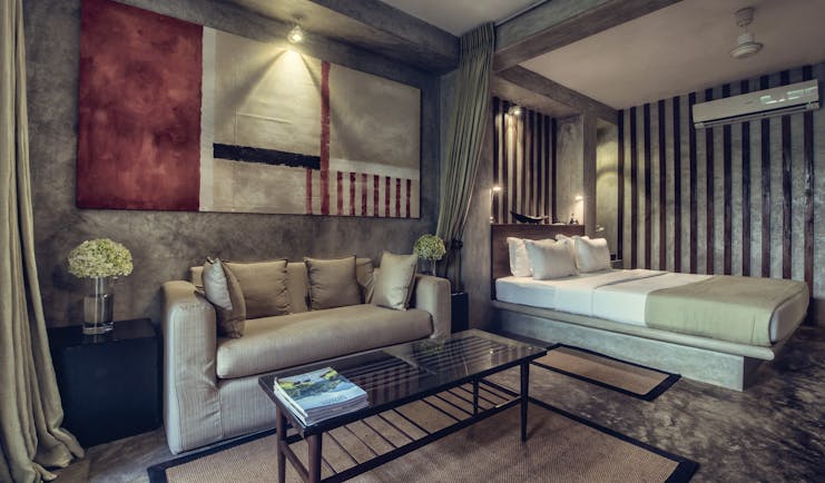 The Lake Lodge garden suite, double bed, sofa, modern decor in muted tones