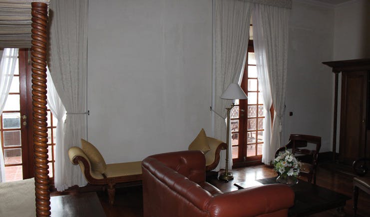 Galle Face Hotel Sri Lanka four poster sofa chaise longue balcony