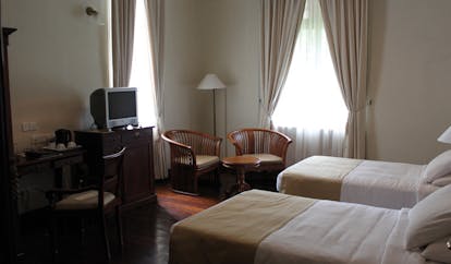  Galle Face Hotel Sri Lanka twin bedroom chairs and television