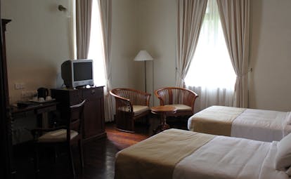 Galle Face Hotel Sri Lanka twin bedroom chairs and television