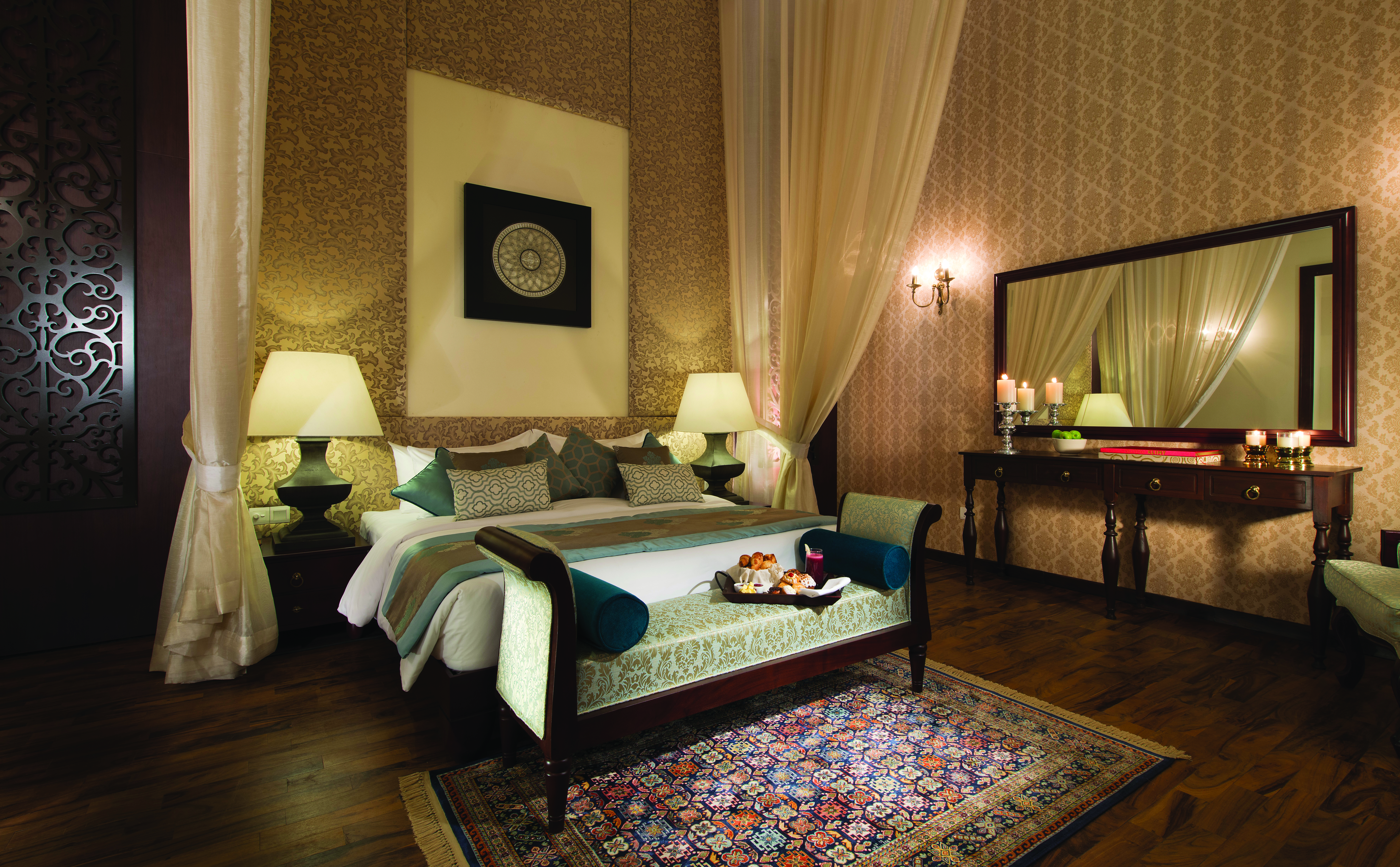 Uga Residence suite, double bed, drapes, grand decor