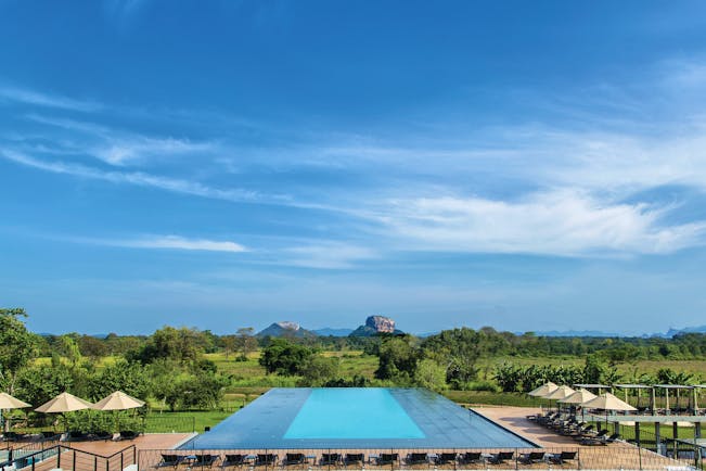 Aliya Sri Lanka infinity pool views across countryside mountains in distance