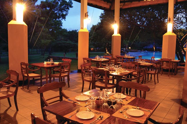 Amaya Lake Resort Sri Lanka restaurant patio outdoor dining area overlooking pool