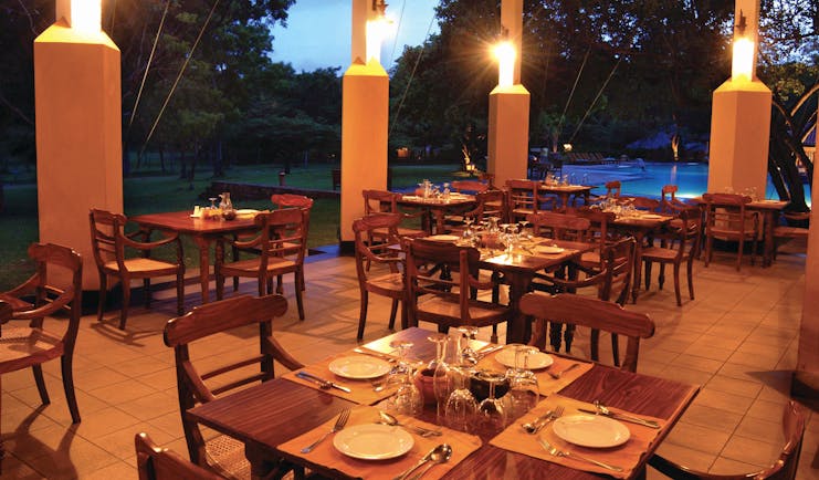 Amaya Lake Resort Sri Lanka restaurant patio outdoor dining area overlooking pool