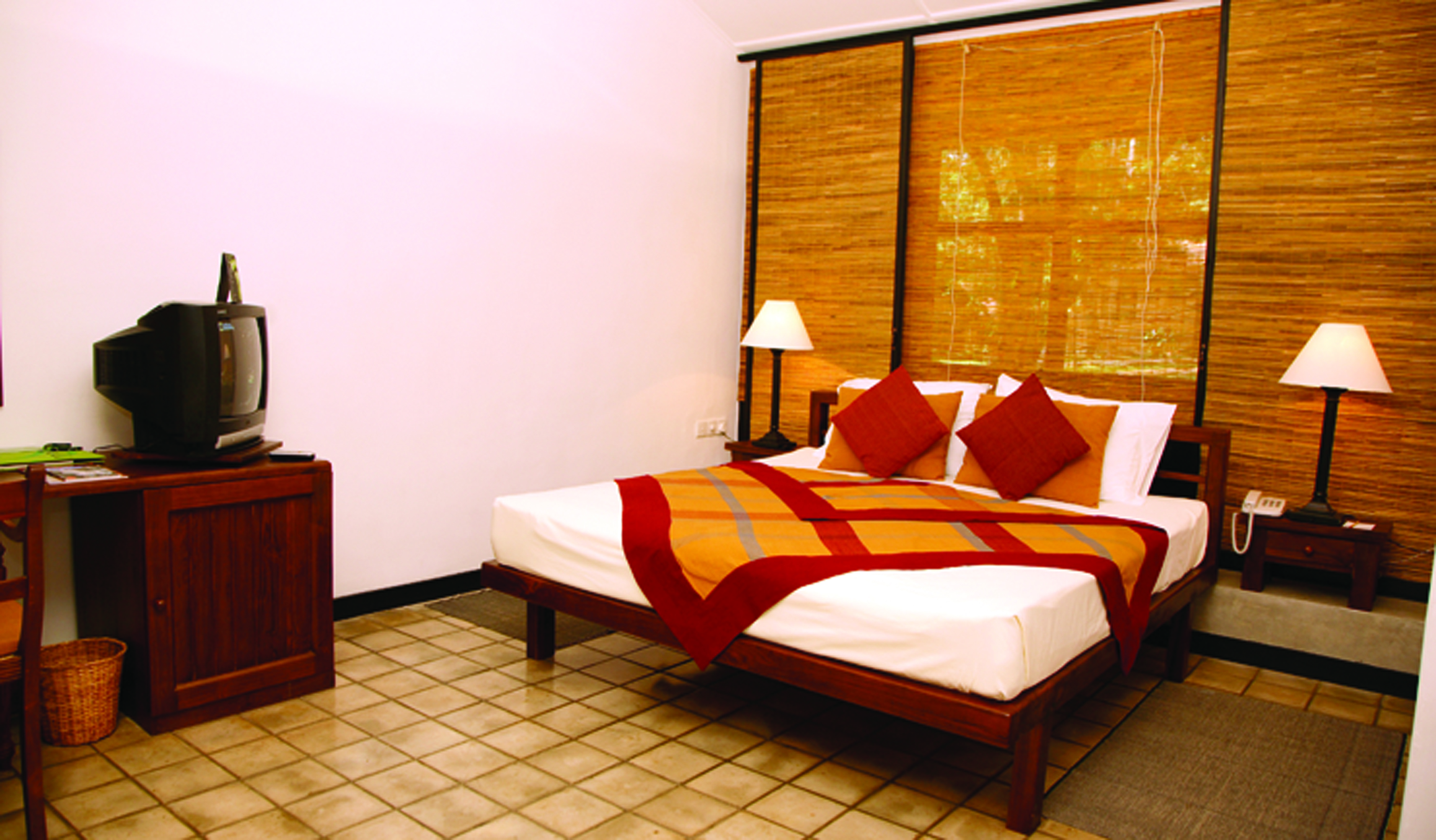 Chaaya Village Sri Lanka superior room bed television modern décor