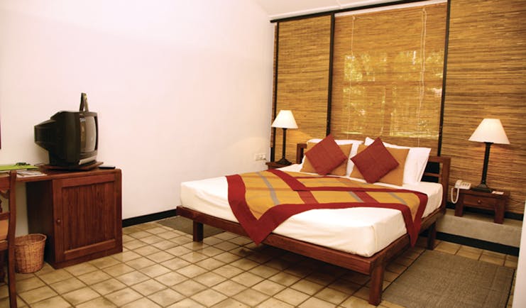 Chaaya Village Sri Lanka superior room bed television modern décor