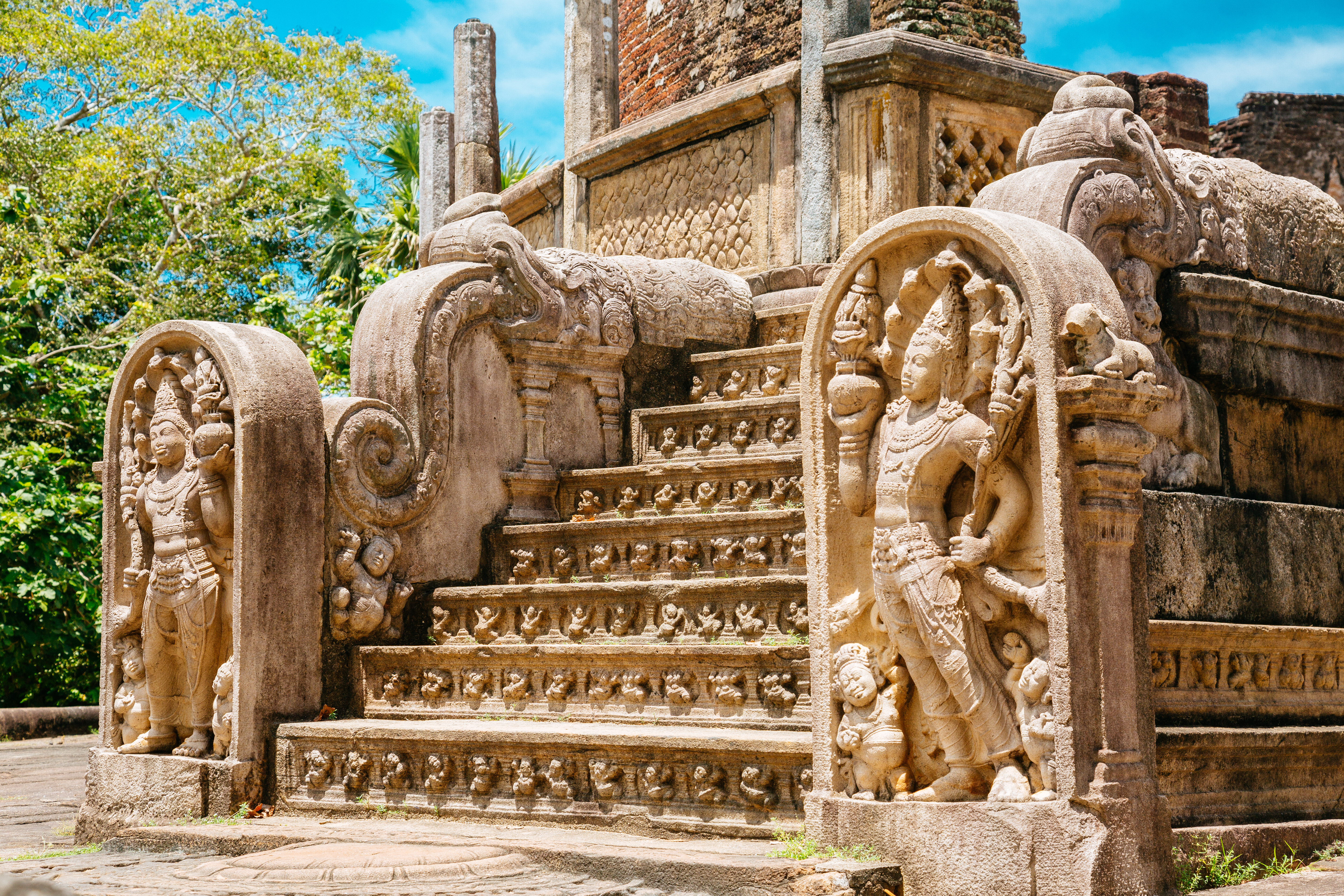 Polonnaruwa temple, intricate stone carvings, buddhas, carved steps