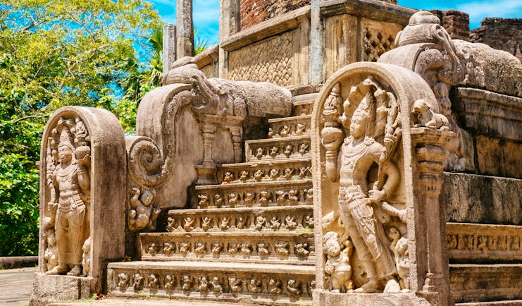 Polonnaruwa temple, intricate stone carvings, buddhas, carved steps
