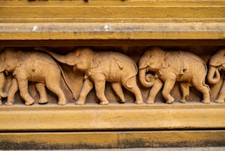 A stone carving of elephants, intricate beautiful details, found in Polonnaruwa in the Cultural Triangle