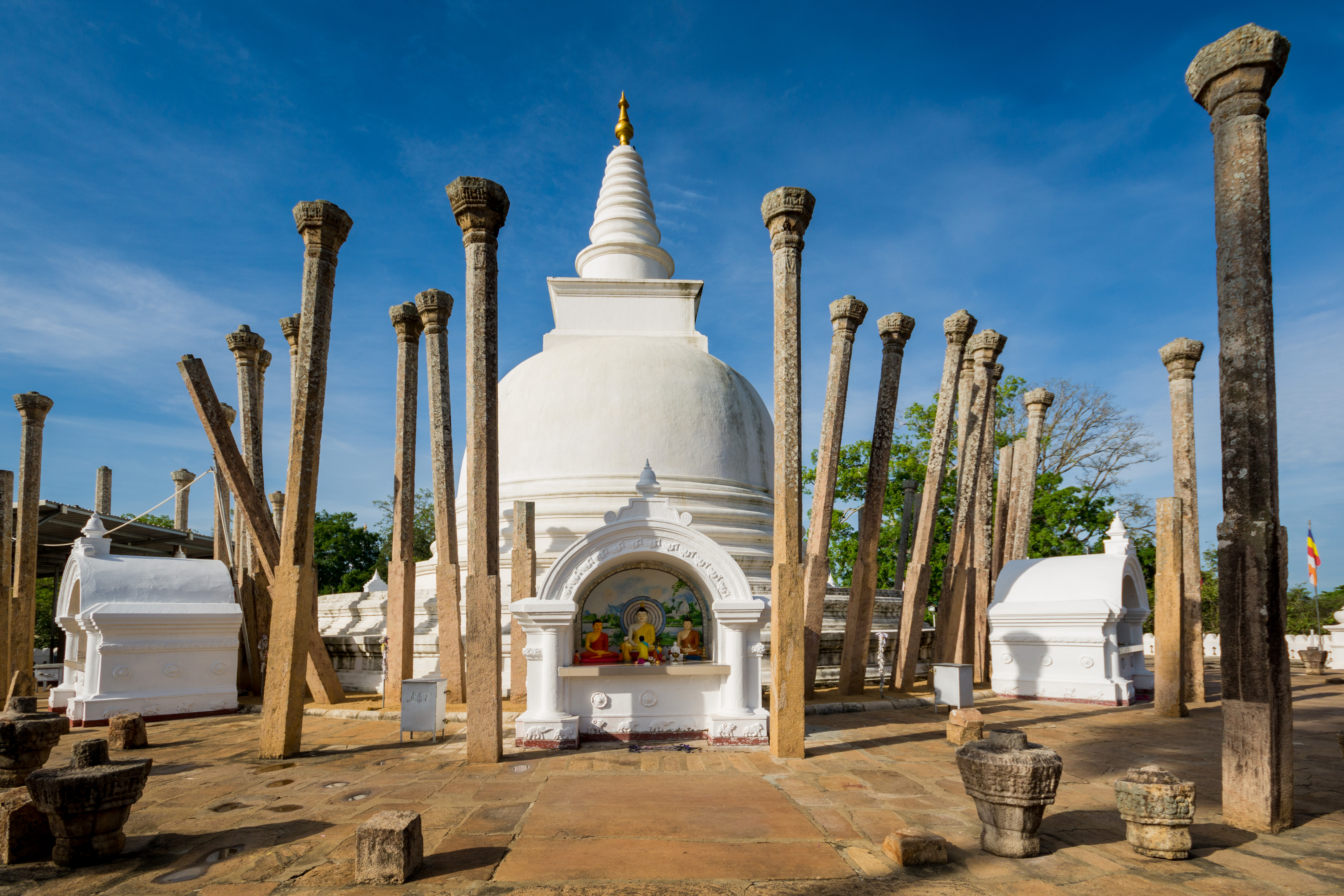 Thuparamaya temple, cultural triangle, ancient stone columns, white domed stupa, buddhist shrine