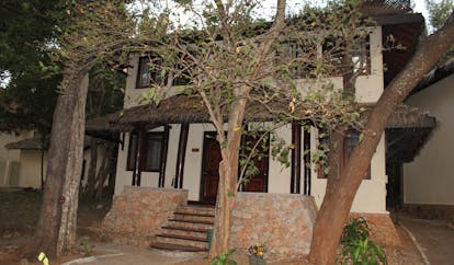 Deer Park Sri Lanka duplex cottage exterior stone steps building trees