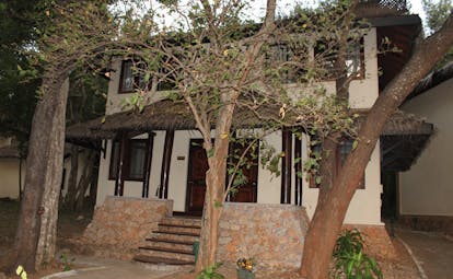Deer Park Sri Lanka duplex cottage exterior stone steps building trees
