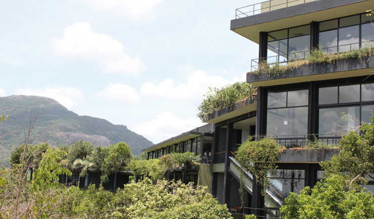 Heritance Kandalama Sri Lanka hotel exterior hotel with balconies and large windows mountain and rainforest view