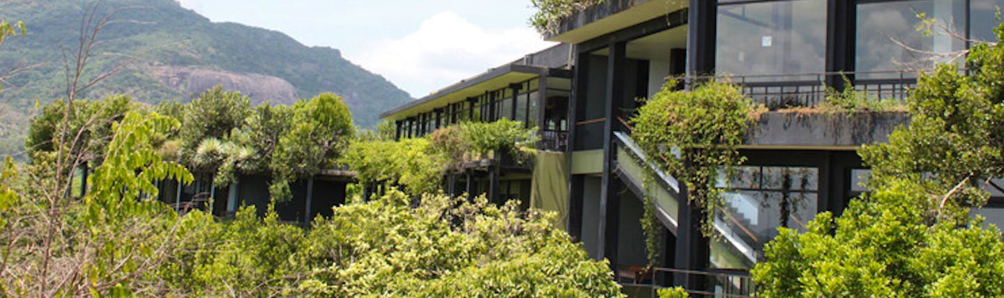 Heritance Kandalama Sri Lanka hotel exterior hotel with balconies and large windows mountain and rainforest view