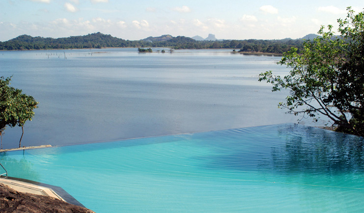 Heritance Kandalama Sri Lanka infinity pool with mountain and sea view