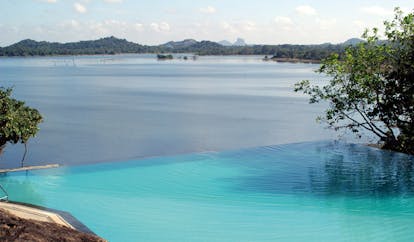 Heritance Kandalama Sri Lanka infinity pool with mountain and sea view