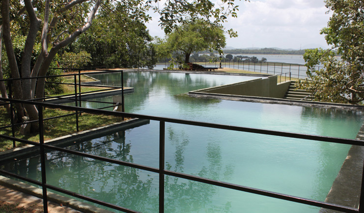 Heritance Kandalama Sri Lanka outdoor swimming pool geometric shaped pool trees and ocean view